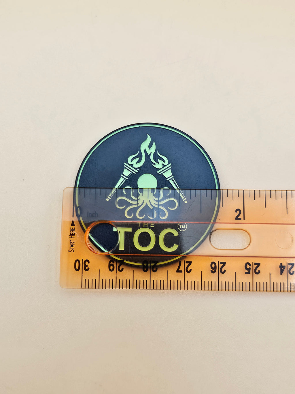 The TOC Founding Challenge Coin – Numbered Glow-in-the-Dark Edition