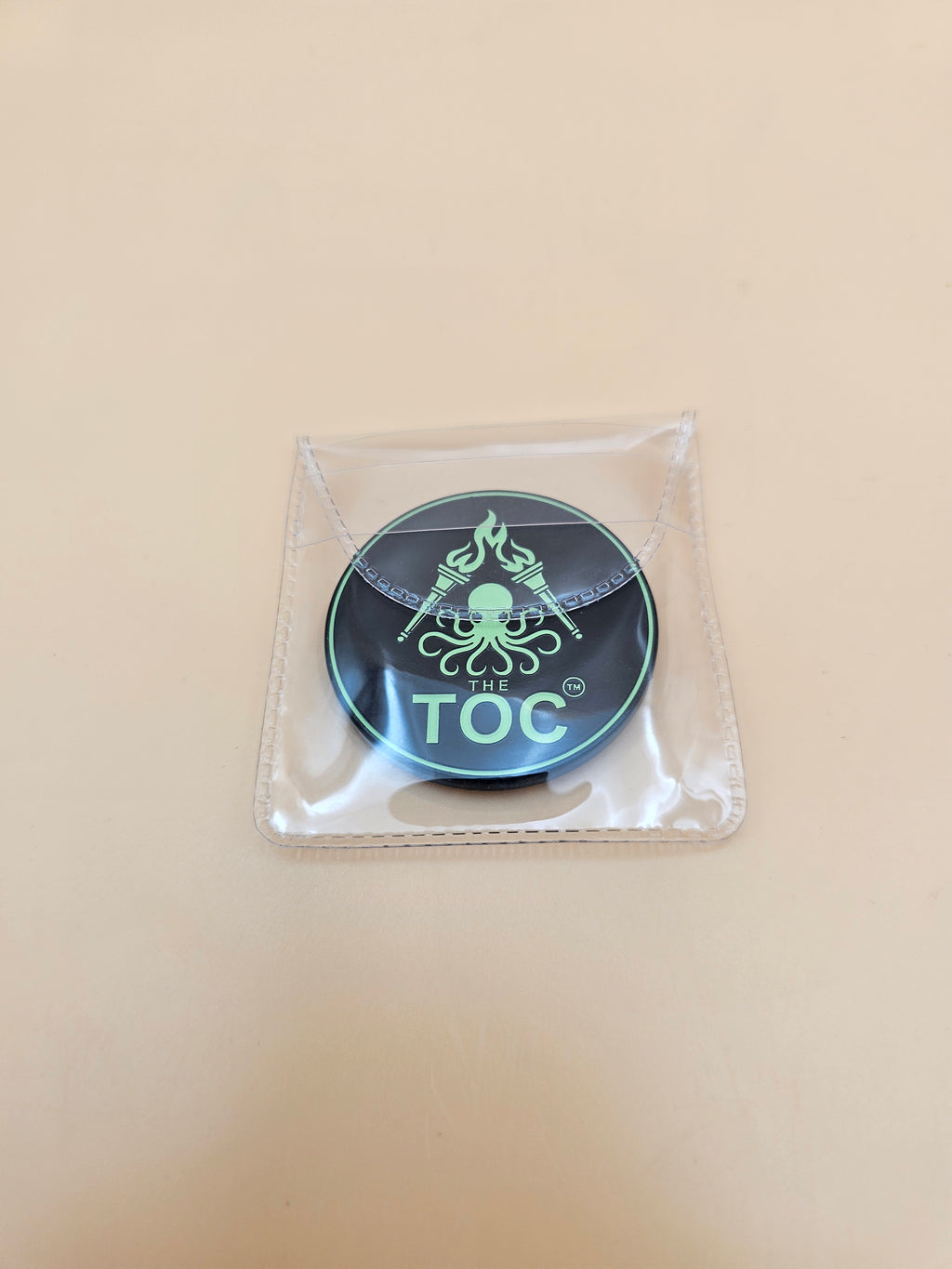 The TOC Founding Challenge Coin – Numbered Glow-in-the-Dark Edition