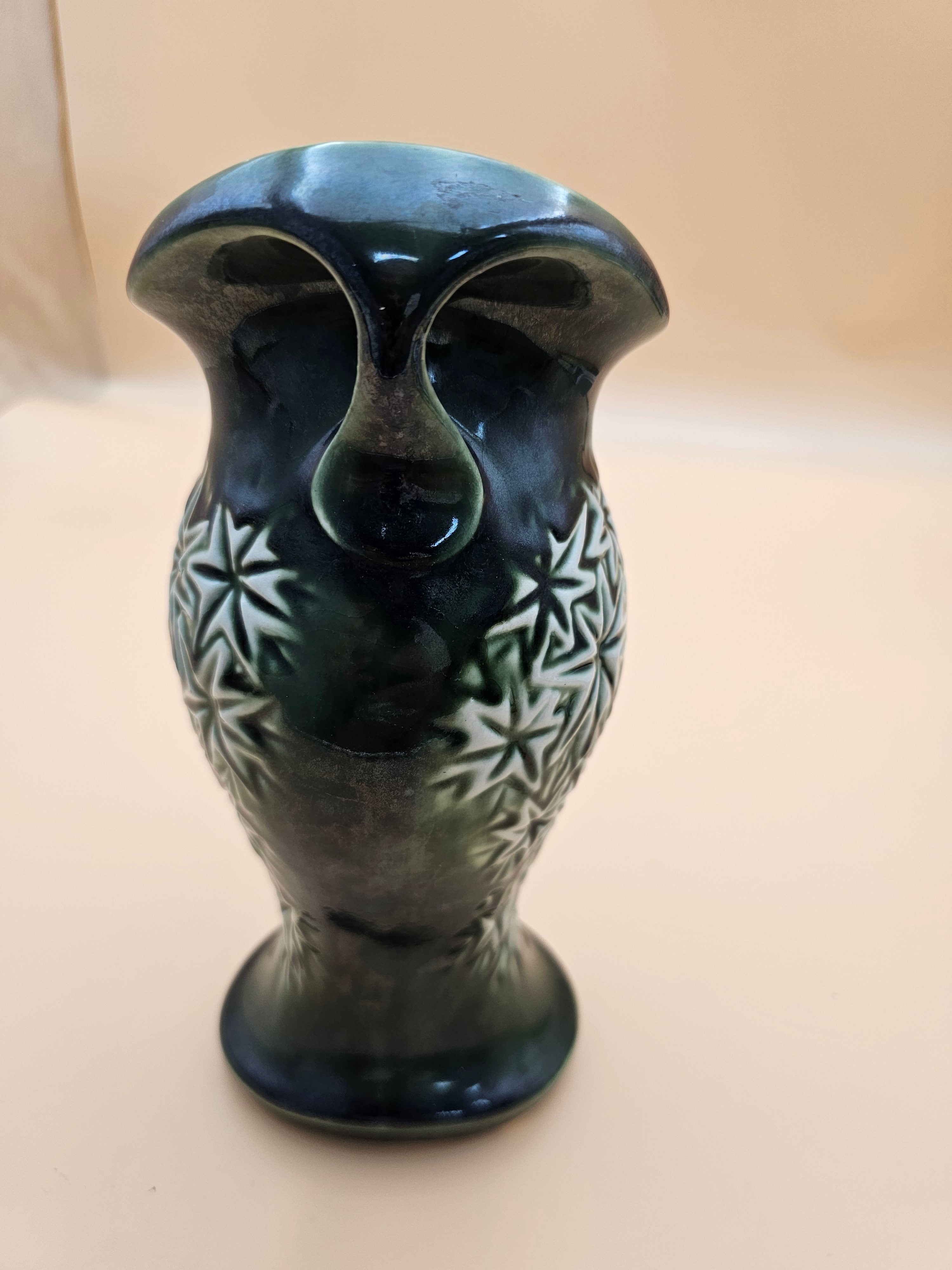 Vintage dark green starburst ceramic two-handled vase produced in 1968 by Mount Clemens Pottery/McCoy.