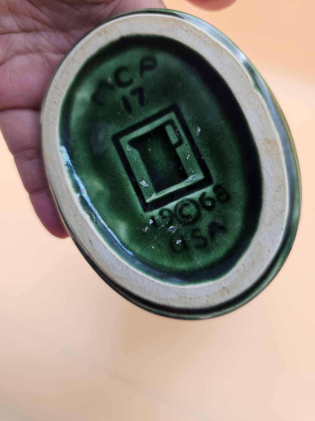 Vintage dark green starburst ceramic two-handled vase produced in 1968 by Mount Clemens Pottery/McCoy.