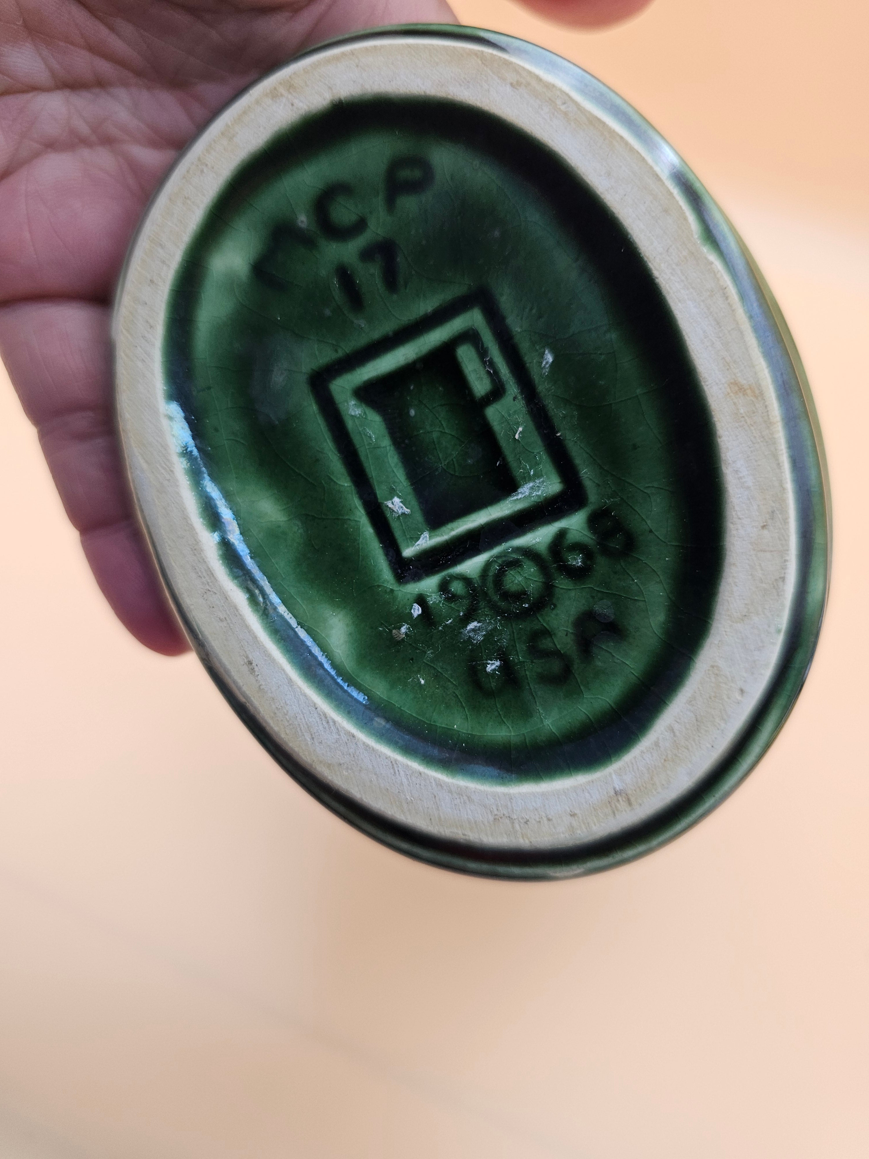 Vintage dark green starburst ceramic two-handled vase produced in 1968 by Mount Clemens Pottery/McCoy.