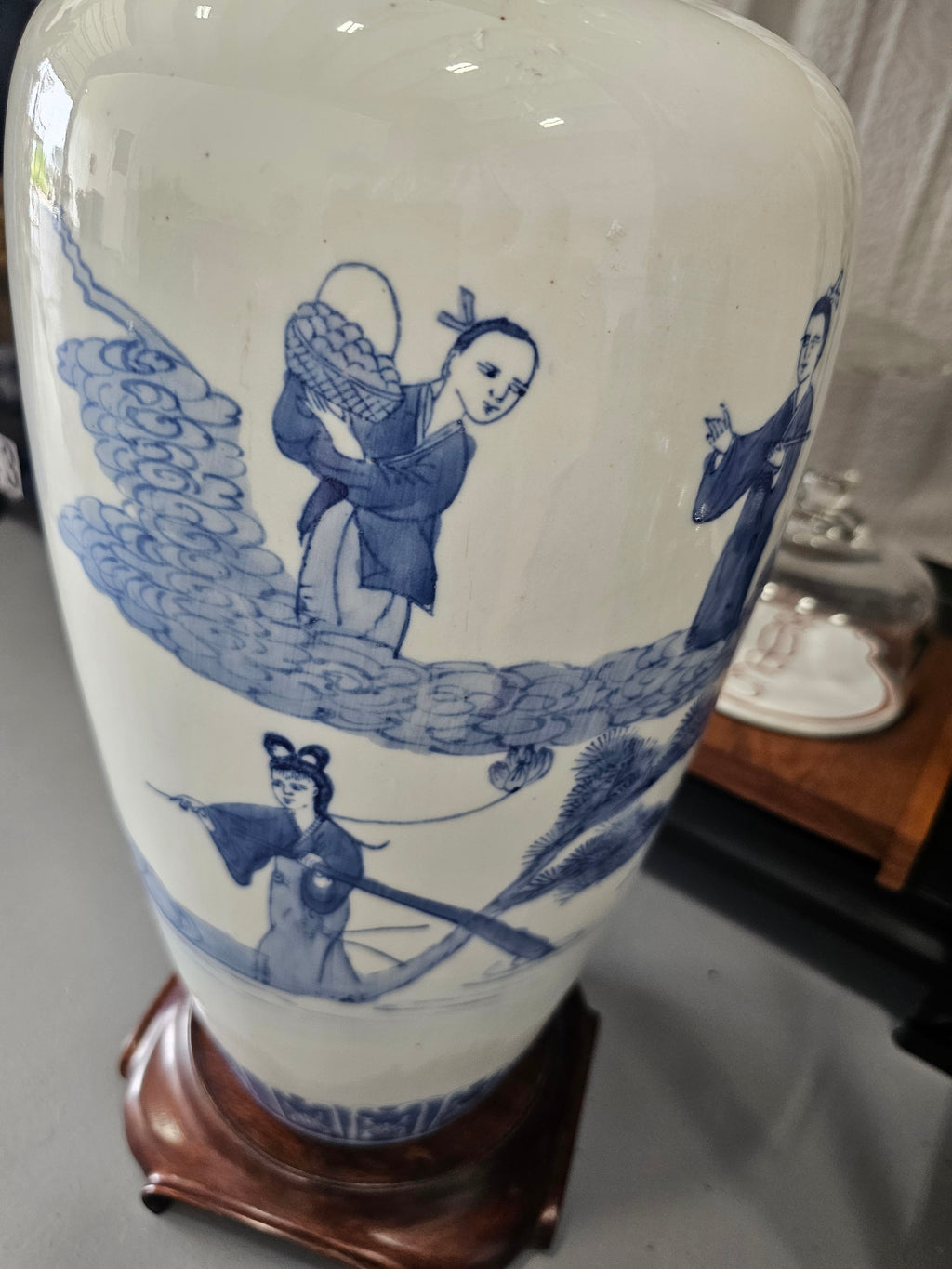 Chinese blue and white porcelain vase featuring hand-painted figural landscape motifs,